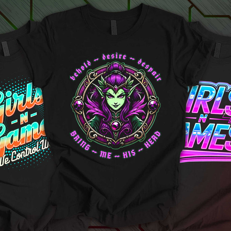 Three black t-shirts with bold gamer girl designs: a green sorceress with "Bring Me His Head" text, a retro style "Girls N Games We Control Worlds" graphic, and a neon pixel design reading "Girls N Games." Perfect for powerful female gamers.