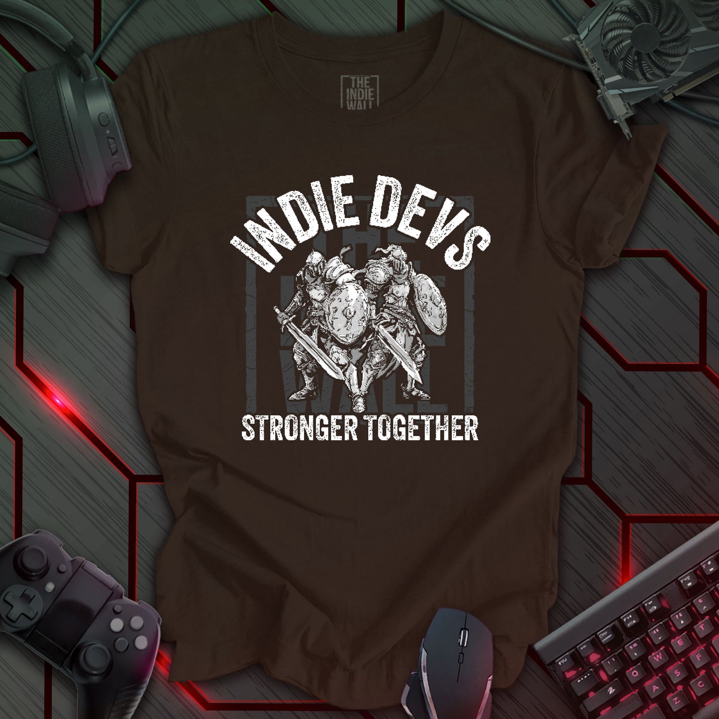 stylized black and white illustration of two armored fantasy warriors standing in front of a large faded Indie Wall brand logo. Bold distressed arched text above reads "INDIE DEVS". Bold text below the image reads "STRONGER TOGETHER". Brown background.