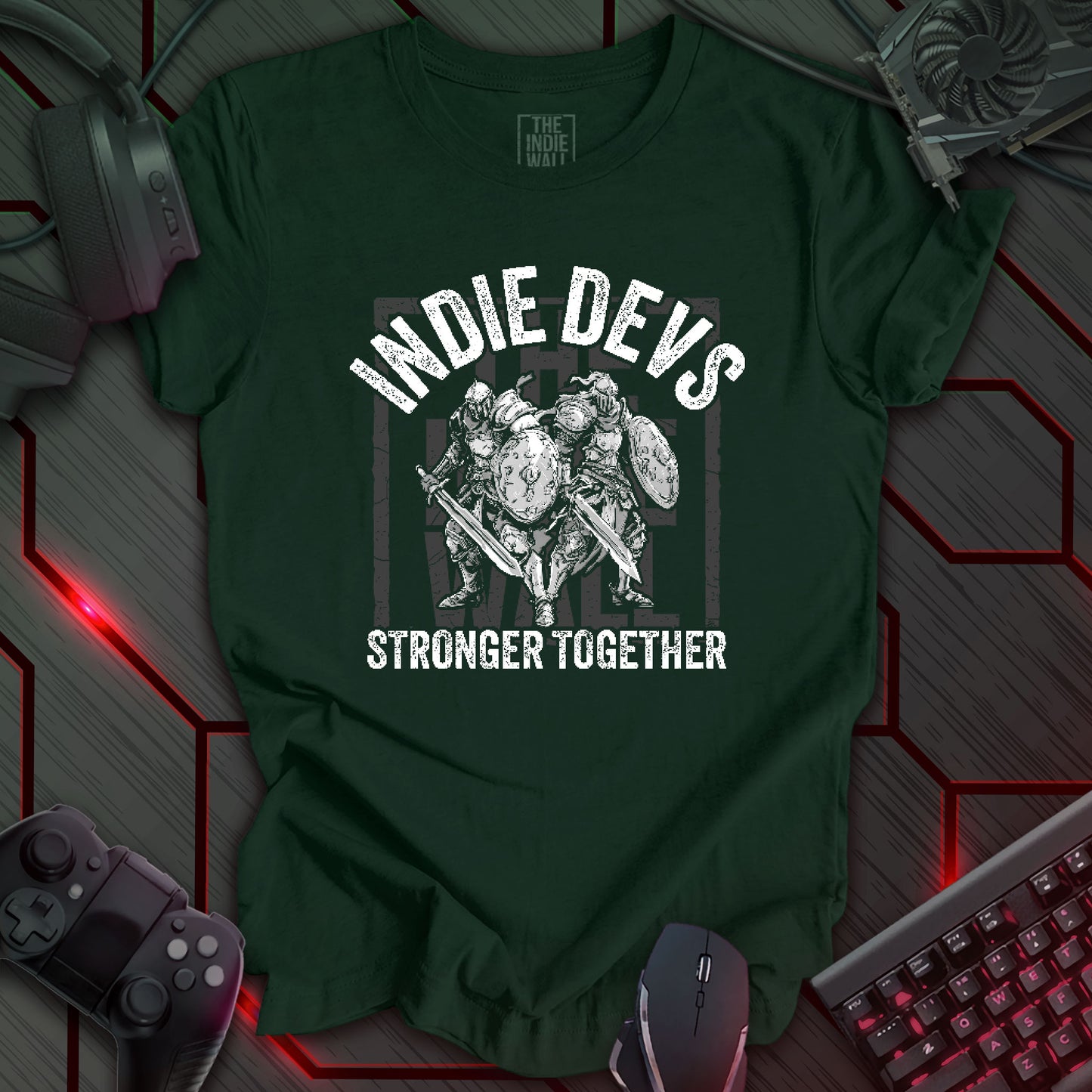 stylized black and white illustration of two armored fantasy warriors standing in front of a large faded Indie Wall brand logo. Bold distressed arched text above reads "INDIE DEVS". Bold text below the image reads "STRONGER TOGETHER". Forest green background.