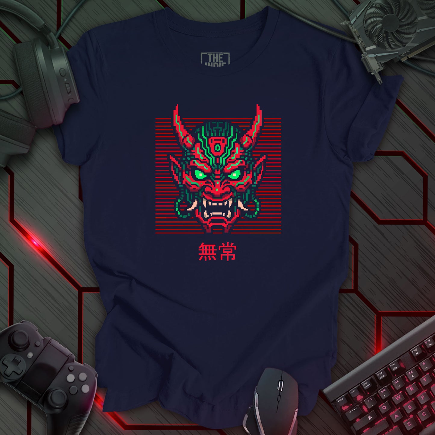 Green and red pixel art cyber oni mask with glowing eyes – retro gaming navy color t-shirt design featuring Japanese kanji for impermanence