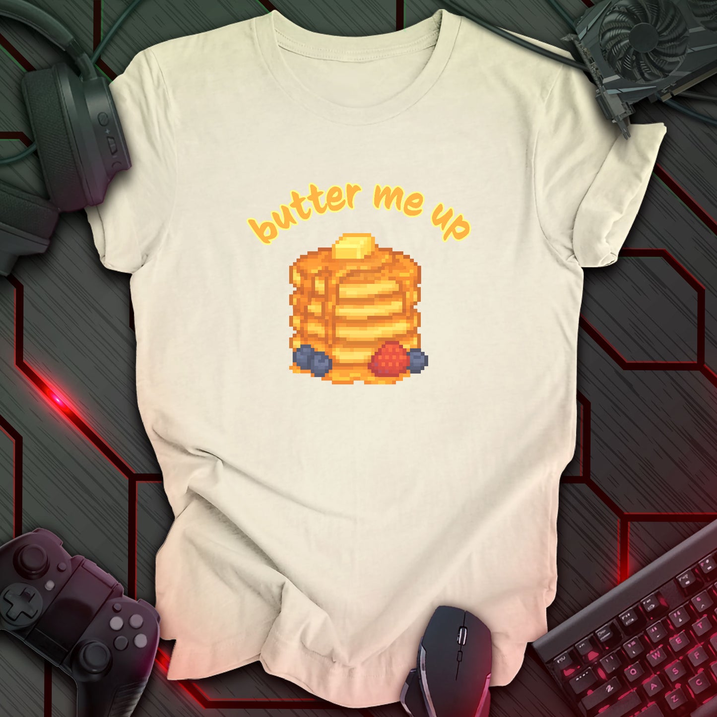 Pixel art stack of pancakes topped with butter and syrup, surrounded by blueberries and a strawberry, with text "butter me up" in kawaii style. Natural color background.