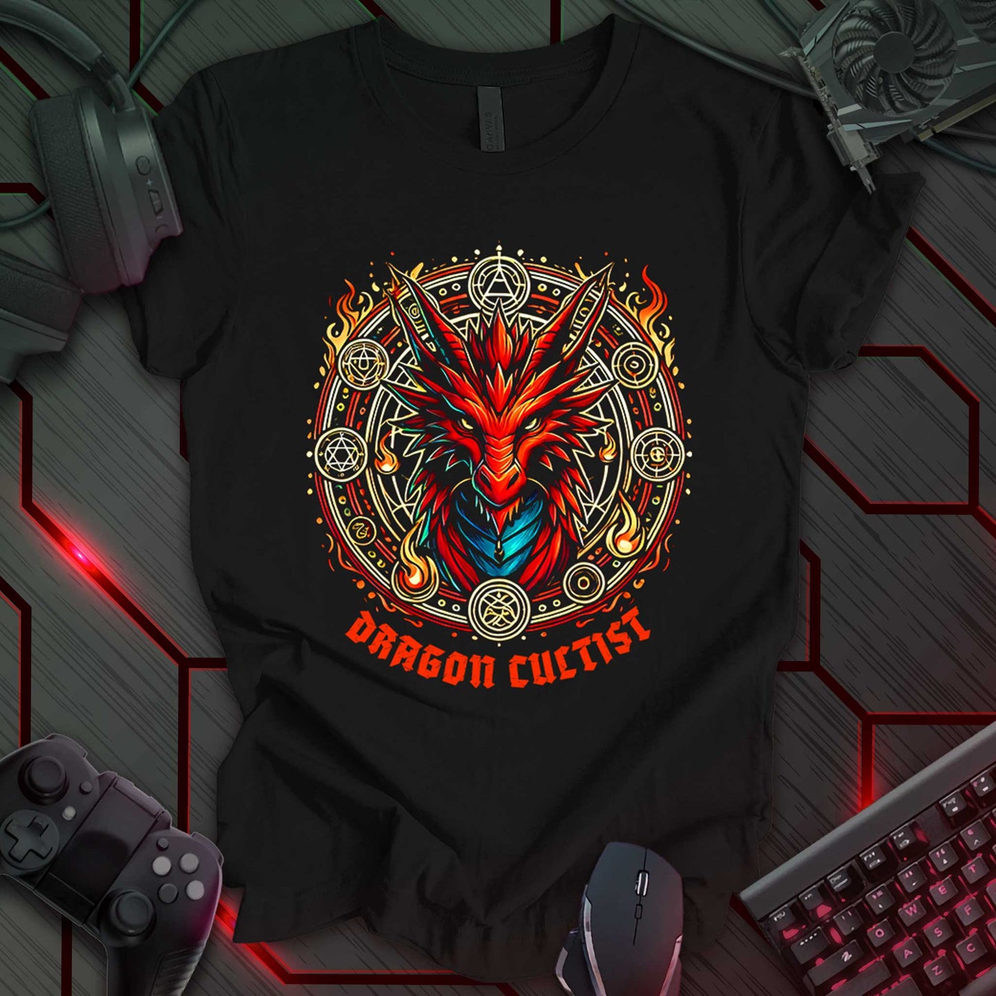 Black gaming t-shirt featuring a detailed red fire dragon portrait. The dragon is framed within an ornate circular design with glowing magical runes, intricate patterns, and flames. Below the artwork, bold distressed medieval-style text reads 'Dragon Cultist' in fiery red.