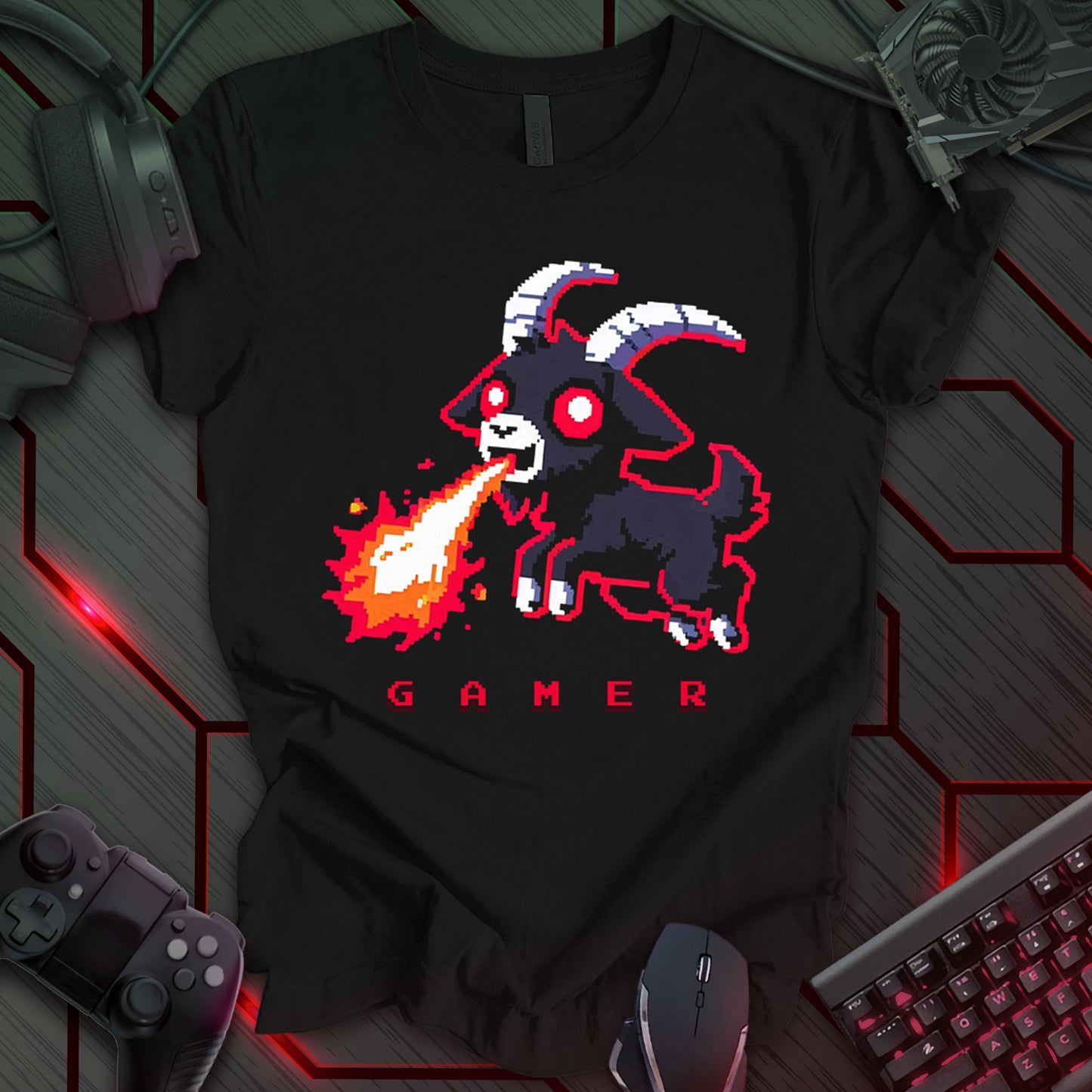 Pixel art illustration of a dark gray goat with white horns and red eyes, breathing fire, set against a black background. Below the goat is the word 'GAMER' in a pixelated font. This is a humorous design with a gaming theme, featuring a pixel art goat and the word 'GAMER'.