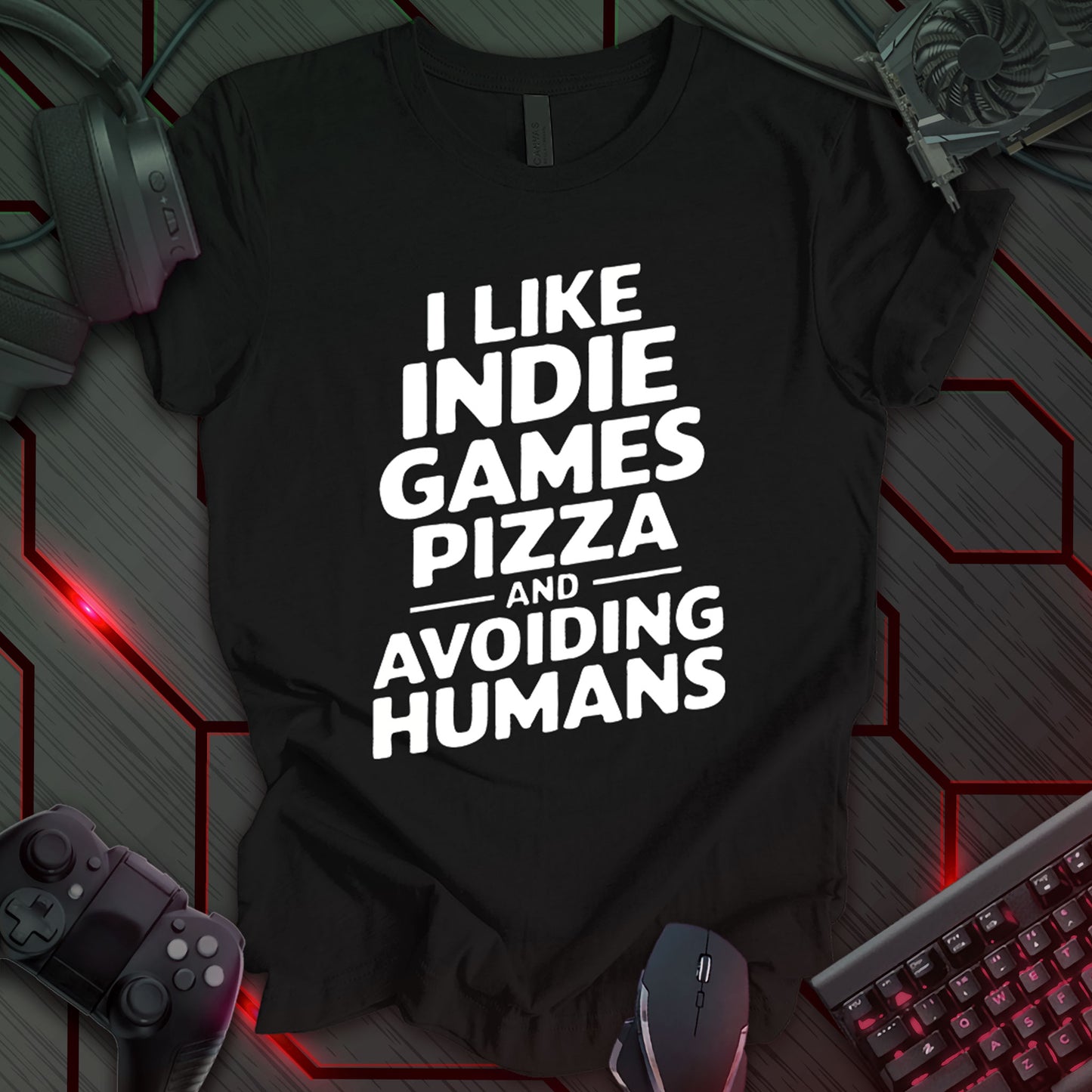 Graphic design featuring the phrase 'I LIKE' in a bold, slightly distressed font at the top, followed by 'INDIE GAMES', 'PIZZA', and 'AND AVOIDING HUMANS' each on separate lines in the same bold, distressed font. The word 'AND' is flanked by two thin horizontal lines. All text is white against a black background. This is a humorous design with an indie gaming and food theme, featuring a relatable sentiment for introverted gamers.