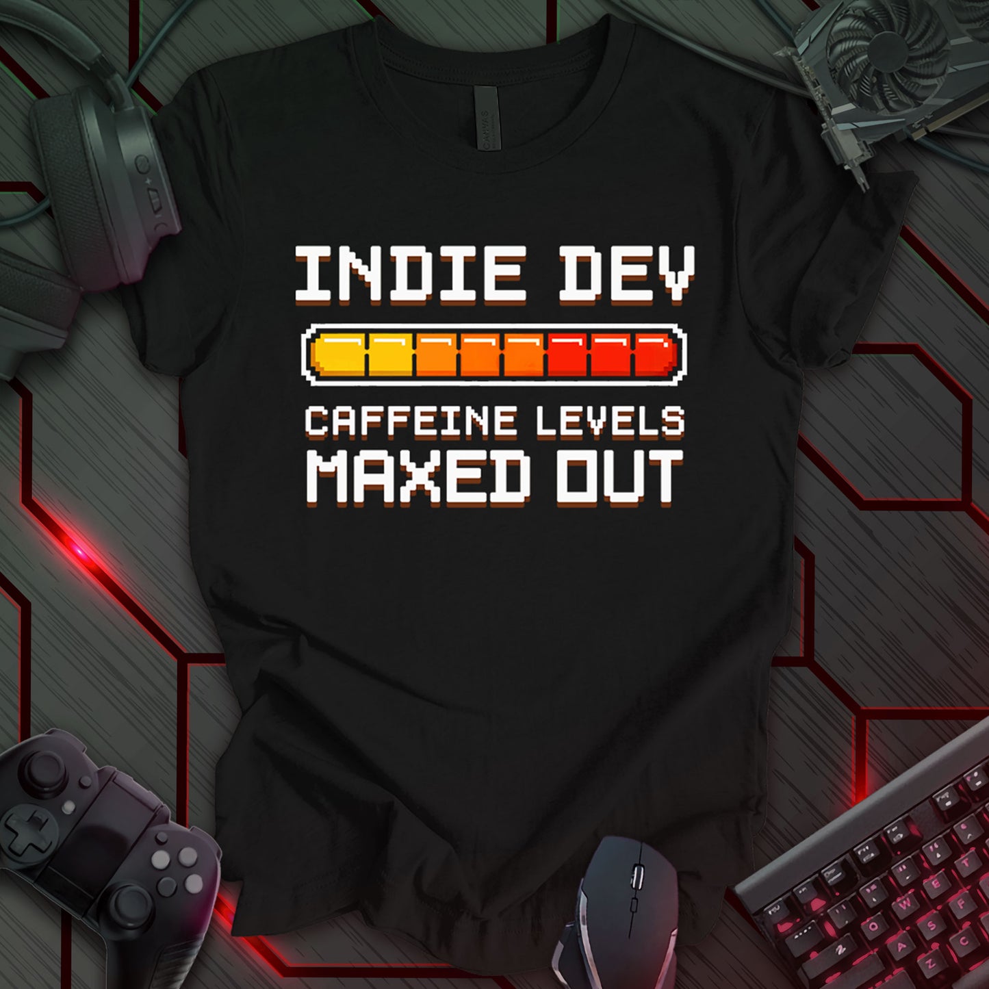 T-shirt design with pixelated text "INDIE DEV" and "CAFFEINE LEVELS MAXED OUT" on a black background. Features a loading bar graphic filled with red and orange, indicating maxed caffeine. Humorous design for indie game developers and programmers. Keywords: indie dev shirt, game developer tee, coding t-shirt, programmer apparel, caffeine humor, developer gift, pixel art tee, indie game development.