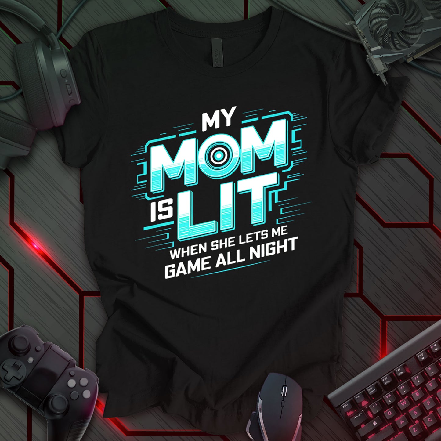 T-shirt design with stylized white and teal text "MY MOM IS LIT" on a black background. Includes "WHEN SHE LETS ME GAME ALL NIGHT" below. Modern, edgy design for gaming moms. Ideal for gifts or casual wear. Keywords: gamer mom shirt, funny kid tee, video game t-shirt, cool mom gift, gaming humor, teen gamer gift, mom appreciation shirt, modern gaming apparel.