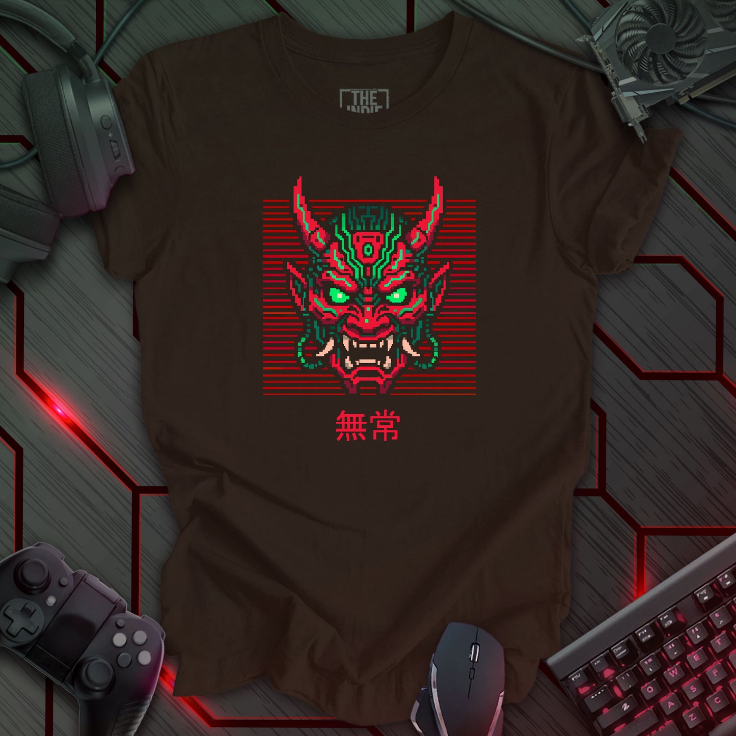 Green and red pixel art cyber oni mask with glowing eyes – retro gaming brown t-shirt design featuring Japanese kanji for impermanence