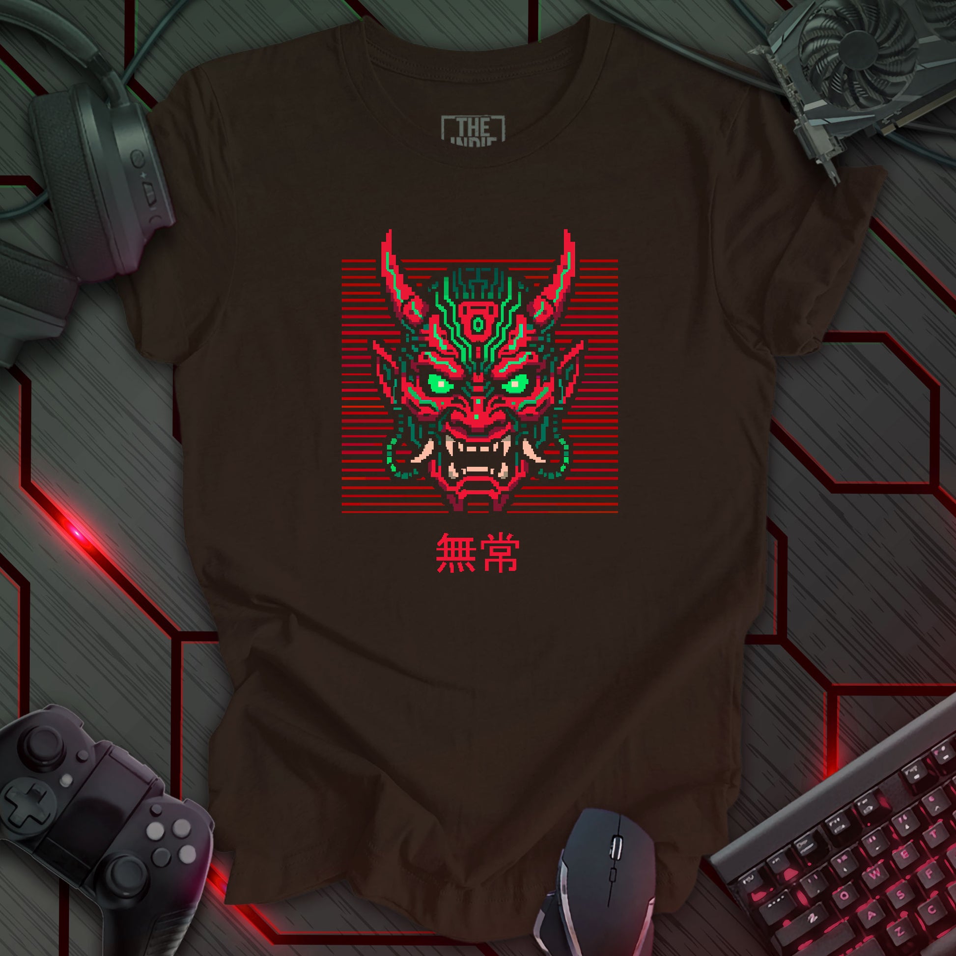 Green and red pixel art cyber oni mask with glowing eyes – retro gaming brown t-shirt design featuring Japanese kanji for impermanence