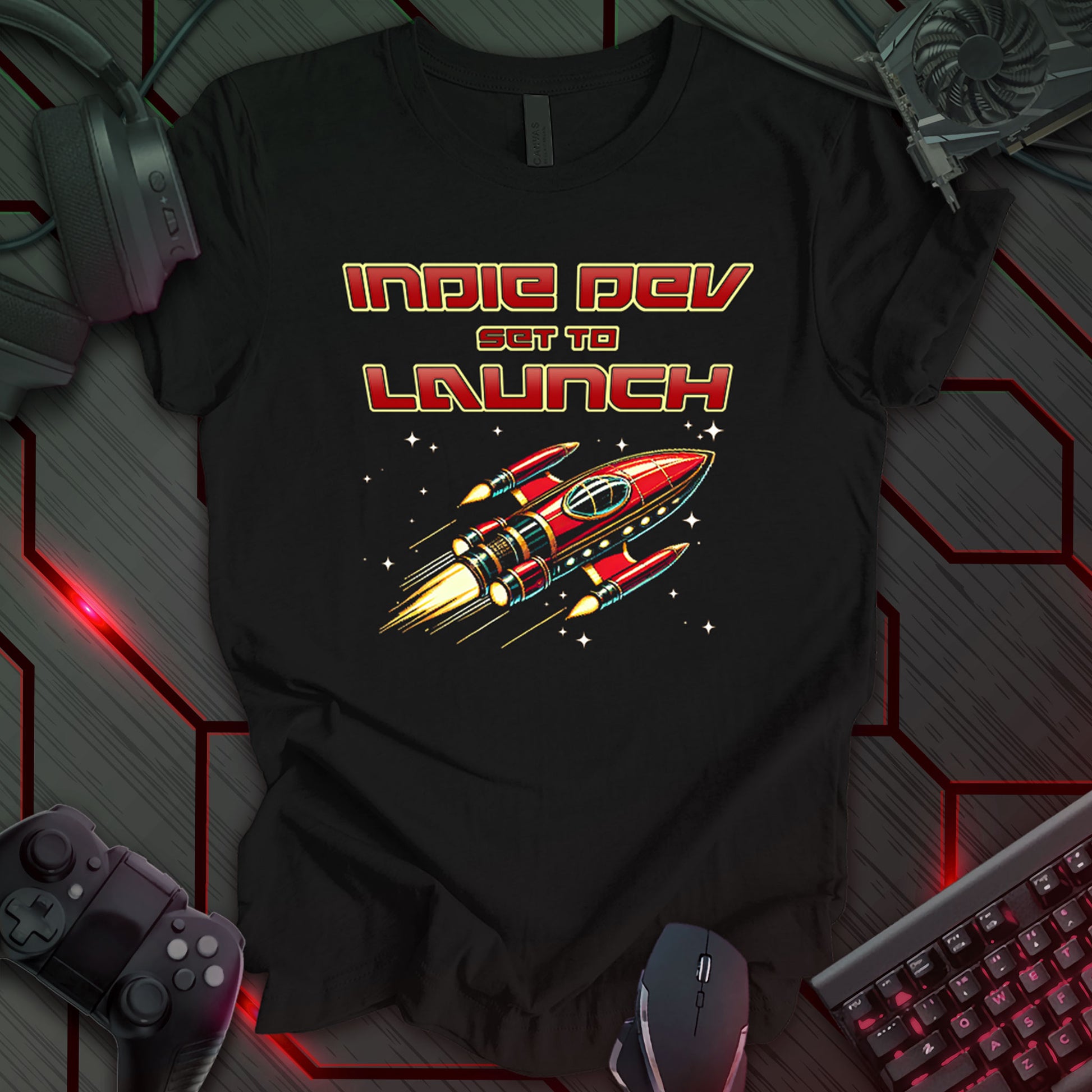 This t-shirt design, created for indie game developers, features the text 'INDIE DEV' in a bold, stylized font above the phrase 'SET TO LAUNCH'. A detailed, retro-style red rocket ship with flames is shown flying against a black background with white stars. This design resonates with the excitement and ambition of launching an independent game.