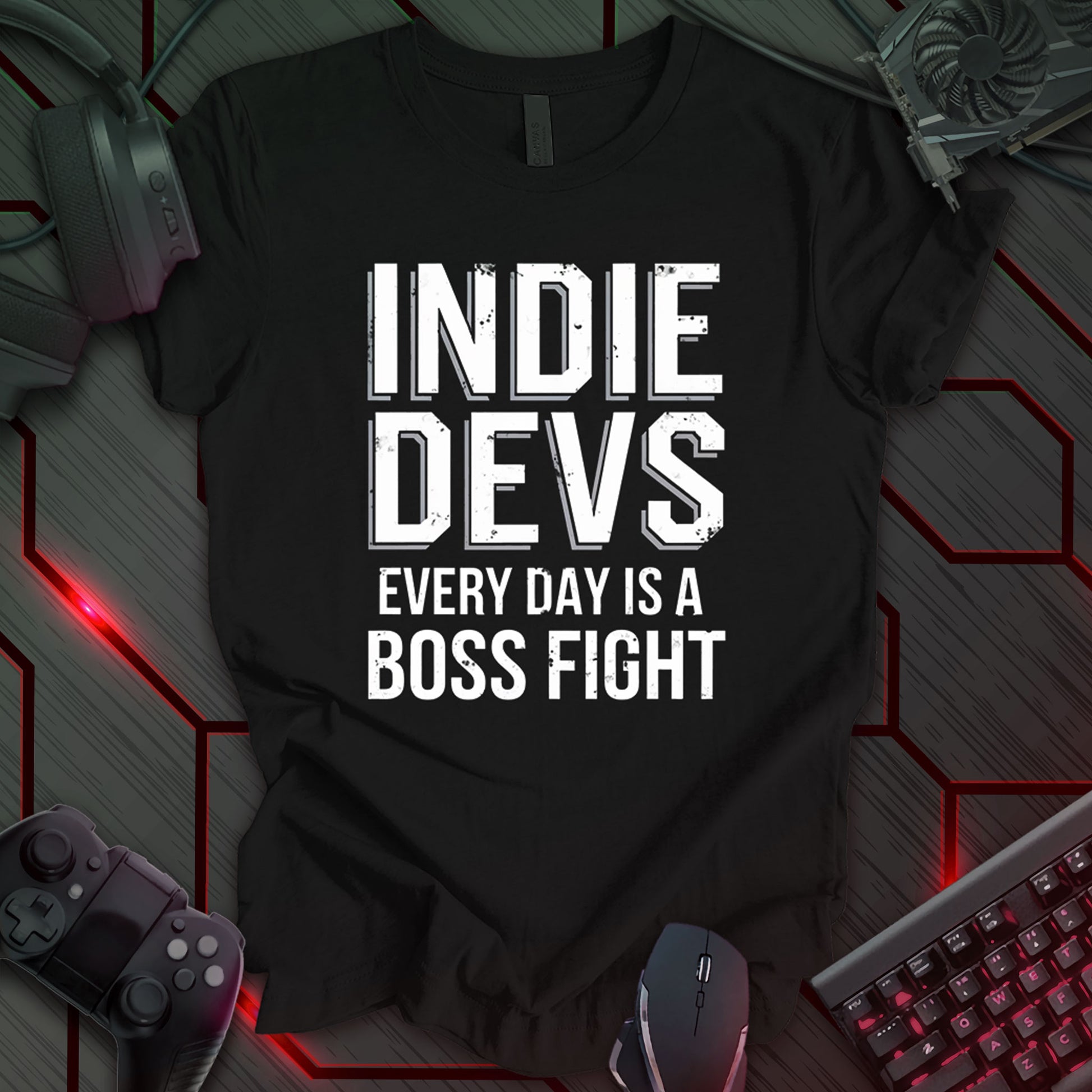 T-shirt design with distressed white text "INDIE DEVS" and "EVERY DAY IS A BOSS FIGHT" on a black background. Design for indie game developers and programmers, highlighting the challenges they face. Keywords: indie dev shirt, game developer tee, coding t-shirt, programmer apparel, gaming humor, developer gift, video game design, indie game development.