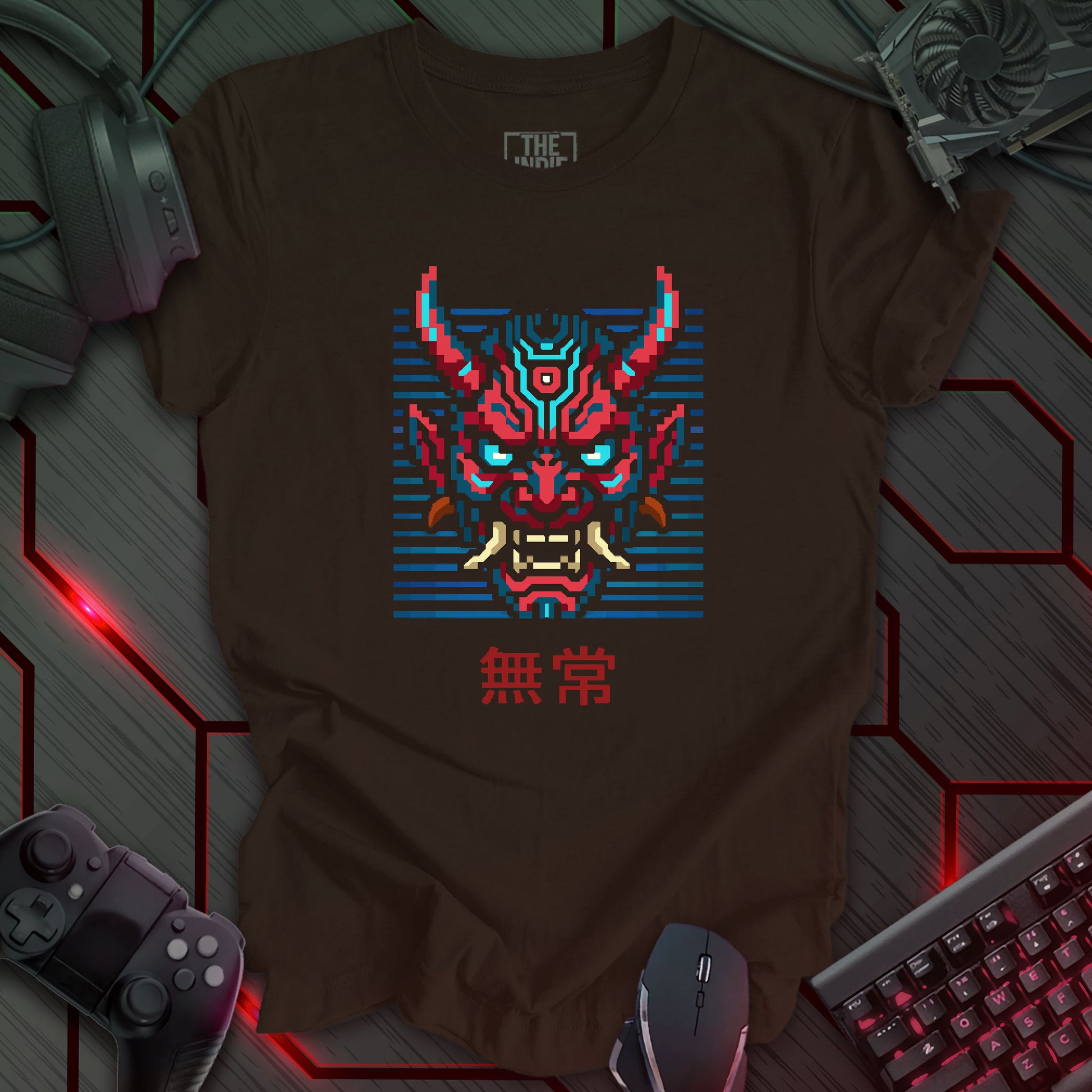 Red and blue pixel art cyber oni mask with glowing eyes – retro gaming brown t-shirt featuring Japanese kanji for impermanence