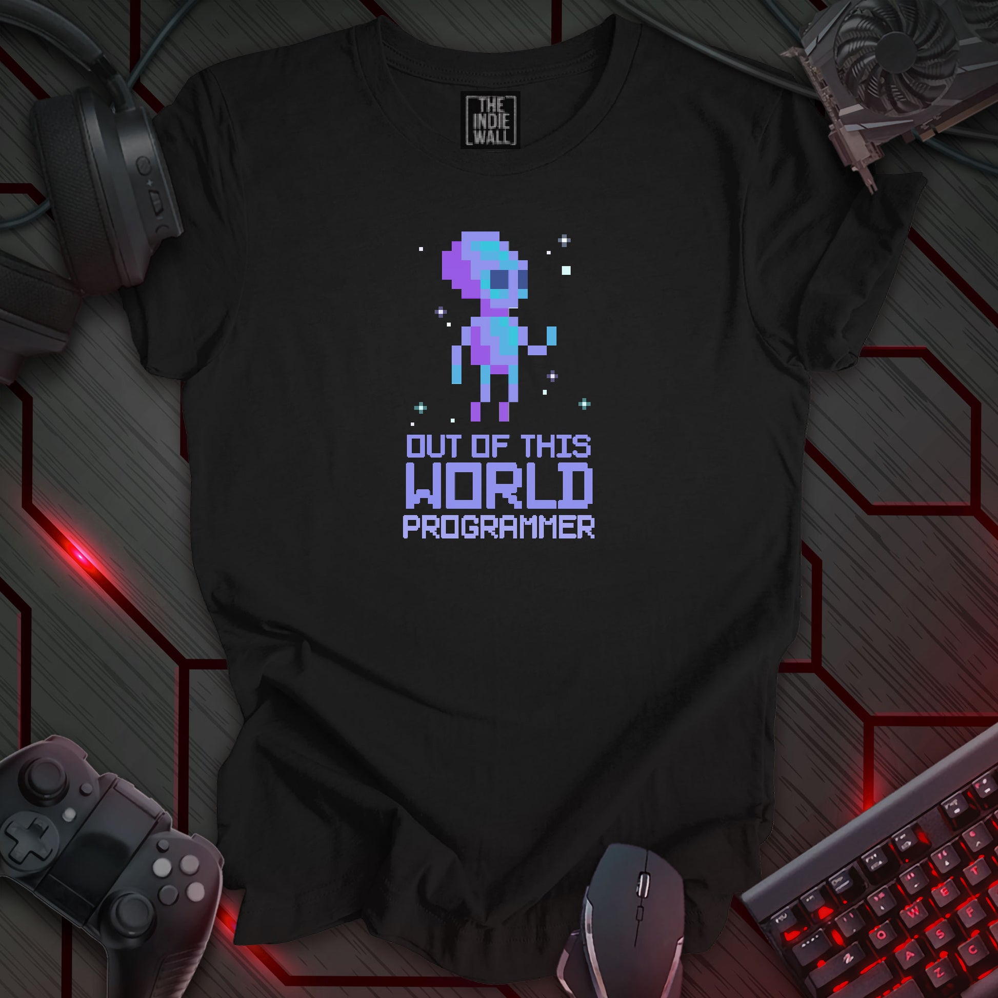 Pixel art illustration of a purple and blue pixelated alien figure floating in space, set against a black background with scattered white and light blue pixelated stars. Below the alien is the phrase 'OUT OF THIS WORLD' in a pixelated font, followed by the word 'PROGRAMMER' in a smaller pixelated font. This is an 'Out Of This World Programmer' themed design for programmers, featuring a playful alien in space motif.