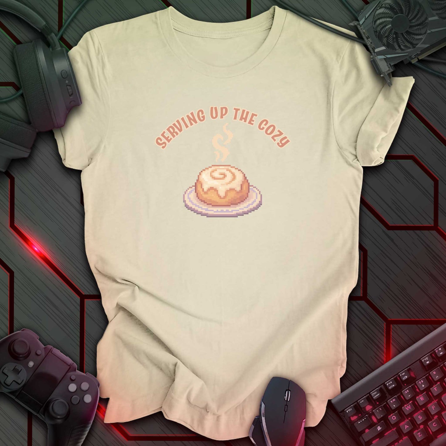 Pixel art cinnamon roll with steam on a plate under text “Serving Up the Cozy” in cozy gamer kawaii style. Natural background.