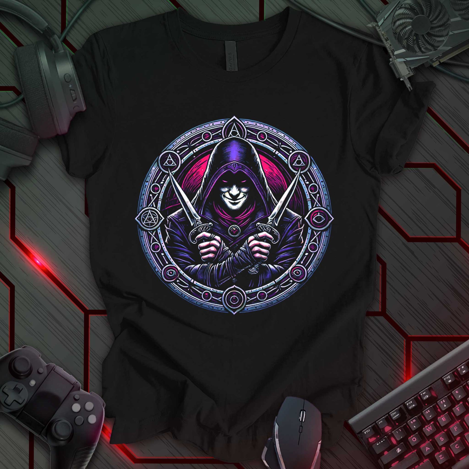 Black gaming t-shirt featuring a hooded assassin in deep red and purple tones, gripping dual daggers. The design is framed by an ornate circular border with arcane and cult-like symbols, perfect for medieval fantasy and RPG fans.
